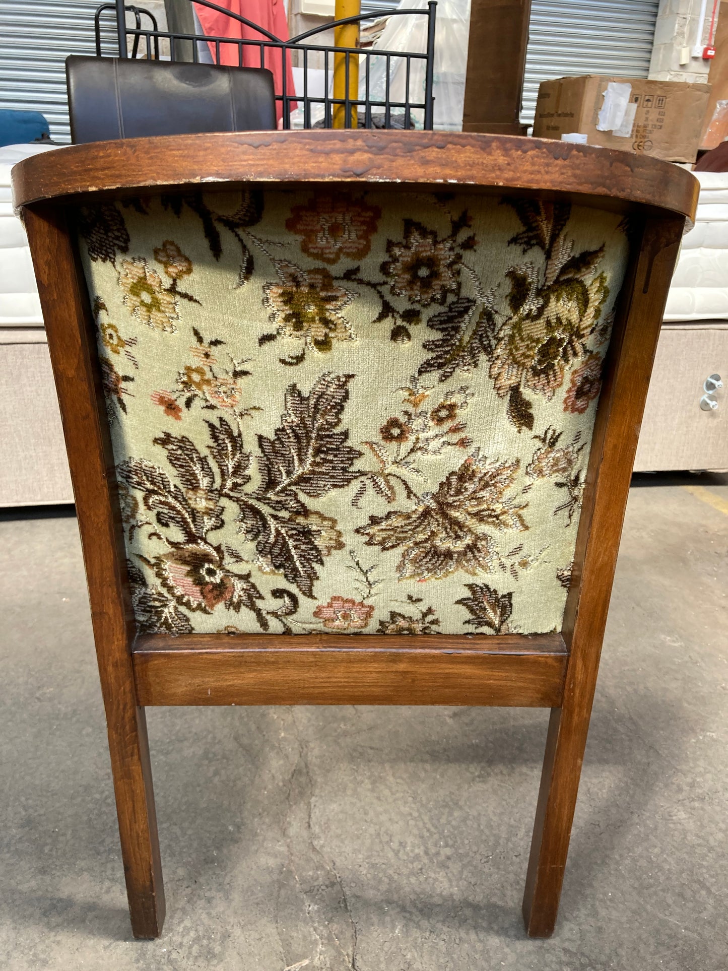 Vintage studded tub chair with floral fabric