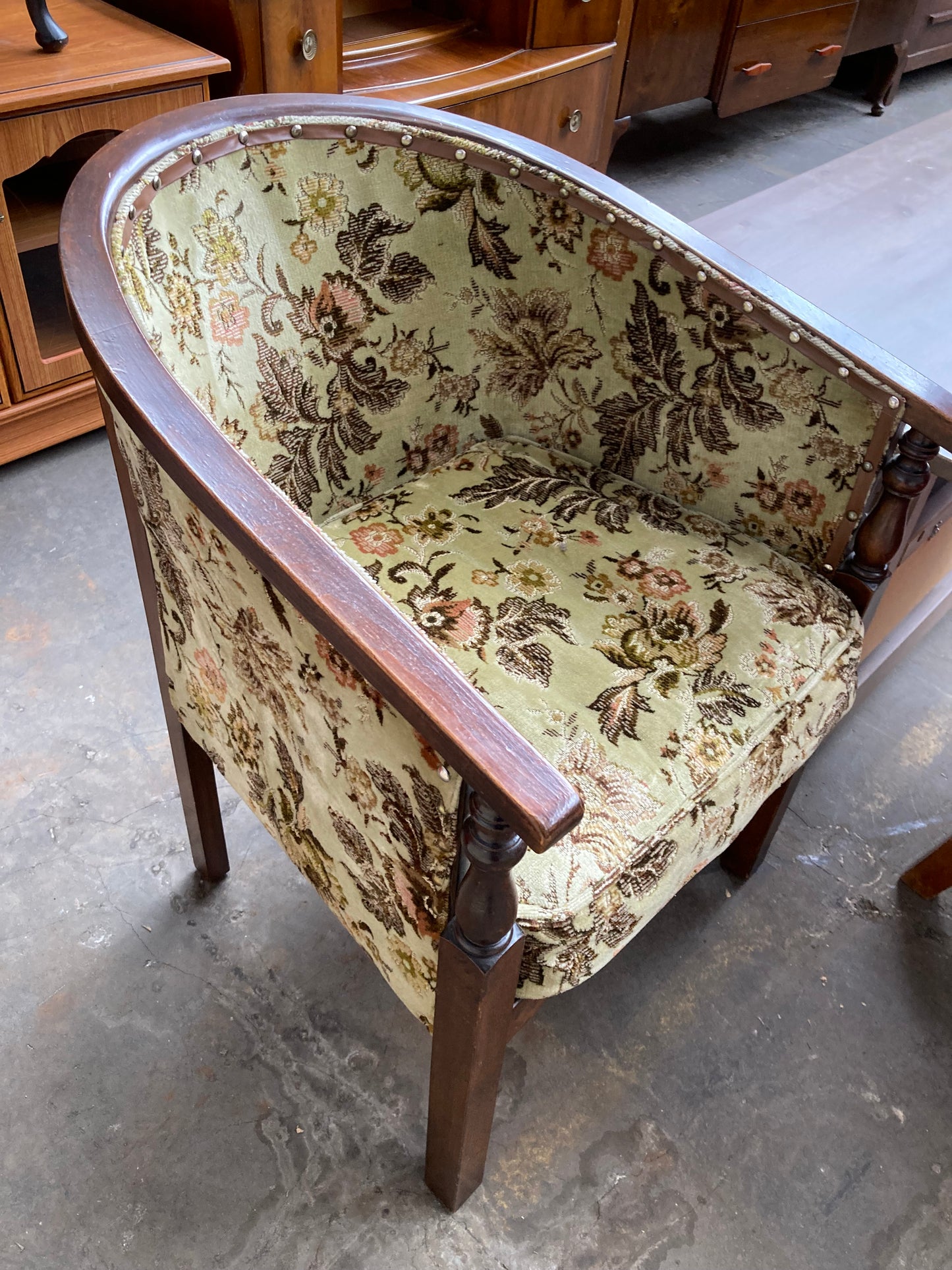 Vintage studded tub chair with floral fabric