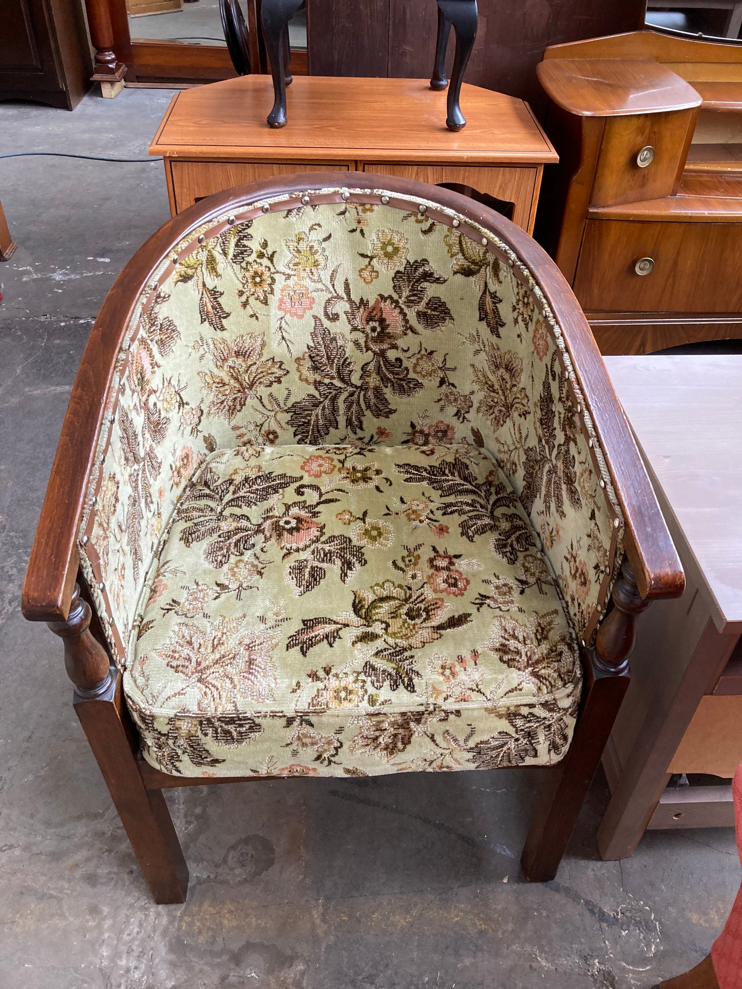 Vintage studded tub chair with floral fabric