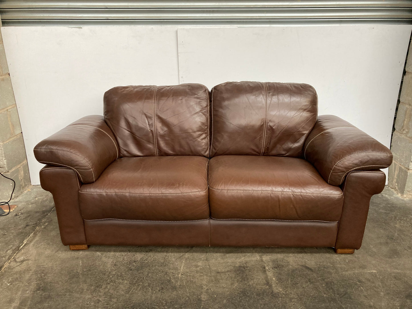 Brown leather 2 seater sofa