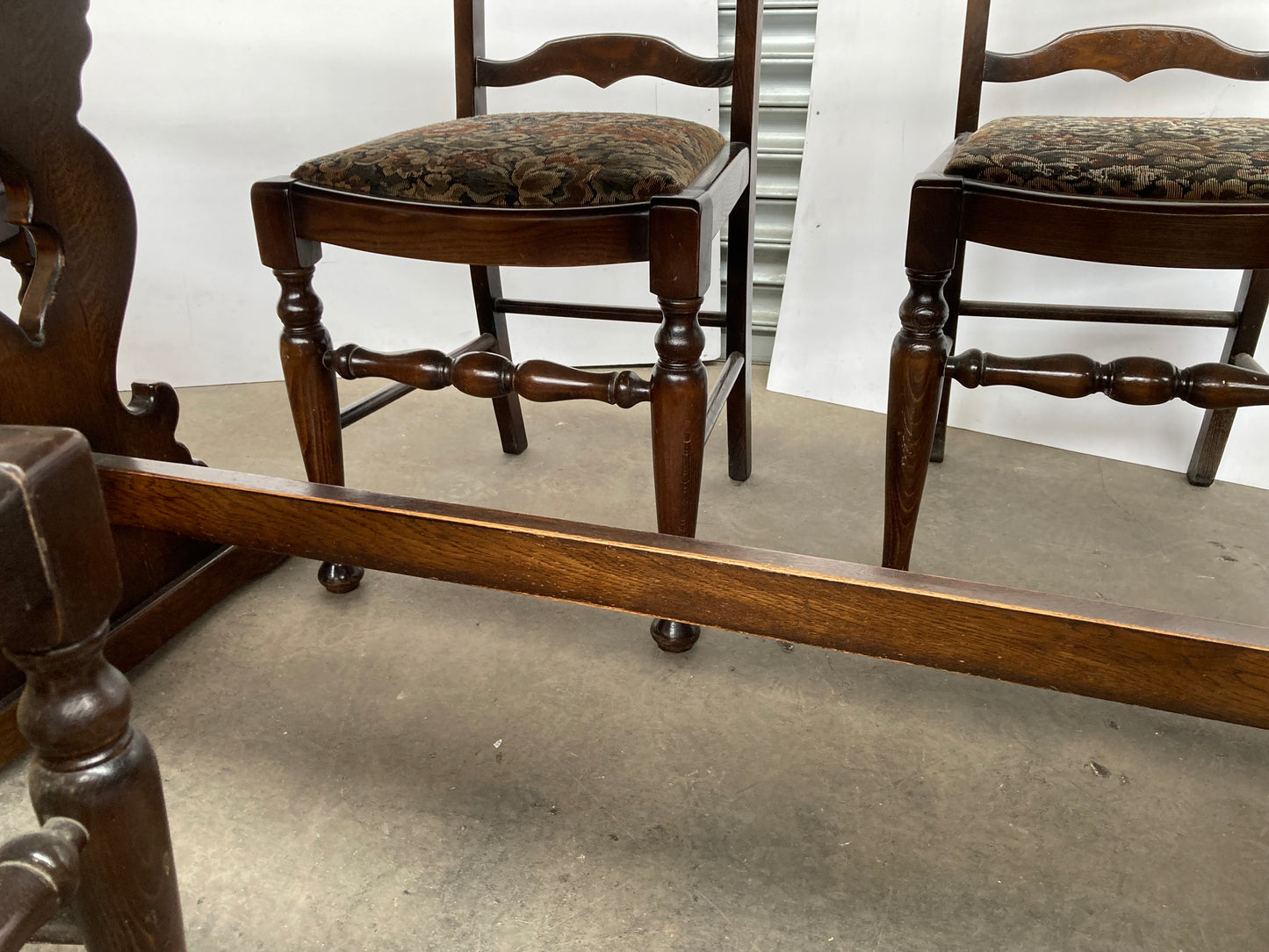 Dark oak dining table and 6 chairs