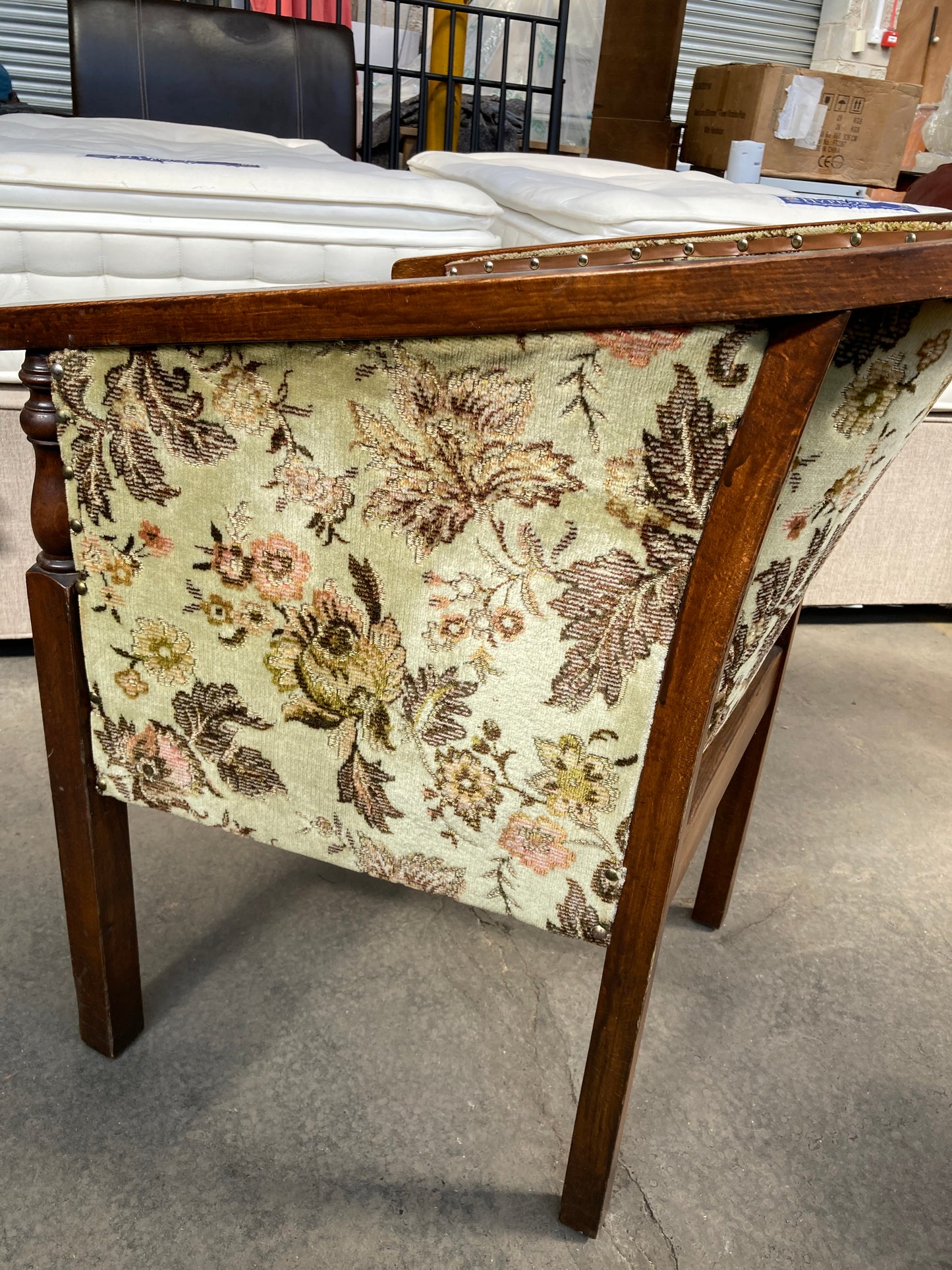 Vintage studded tub chair with floral fabric