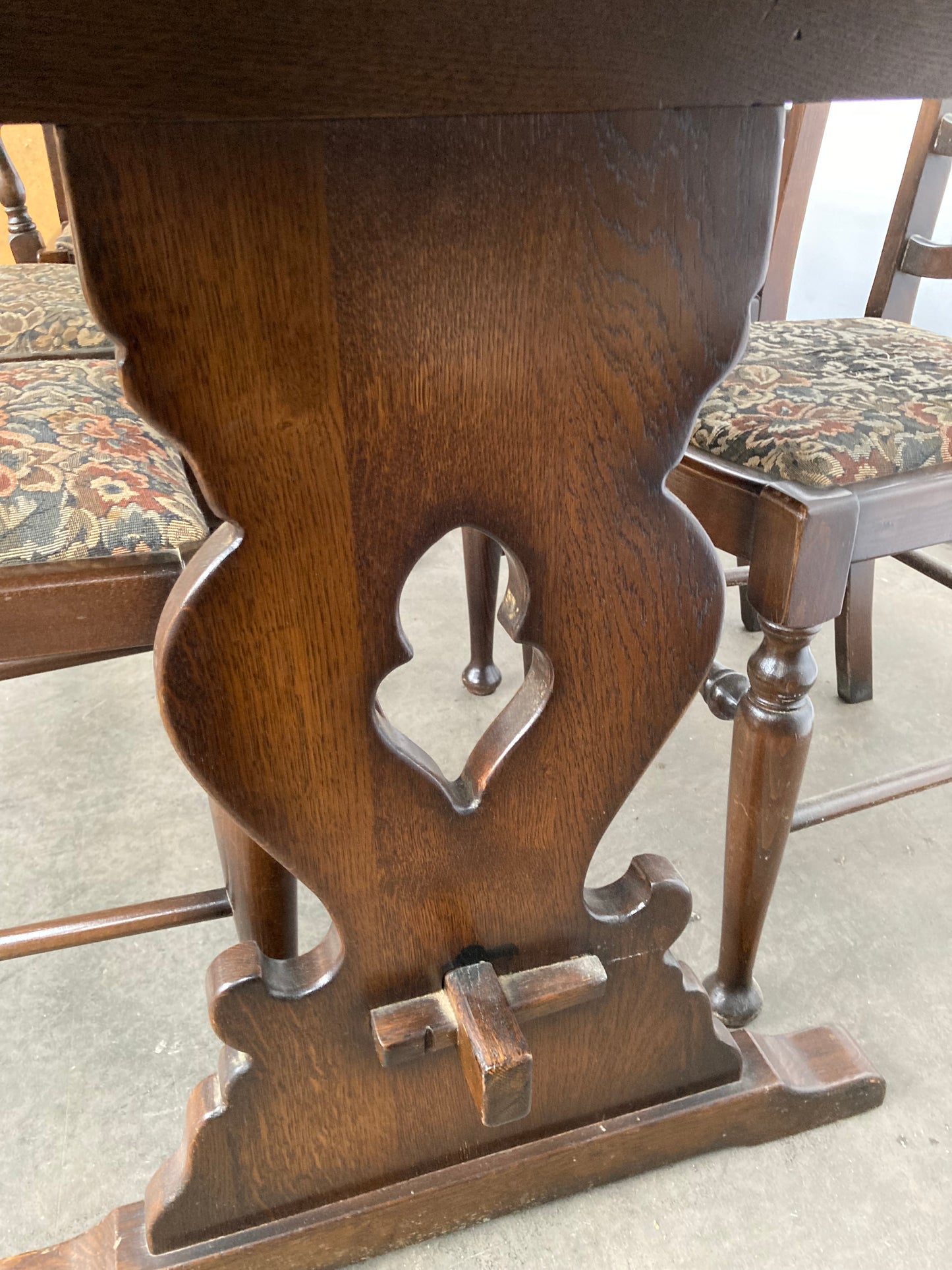Dark oak dining table and 6 chairs