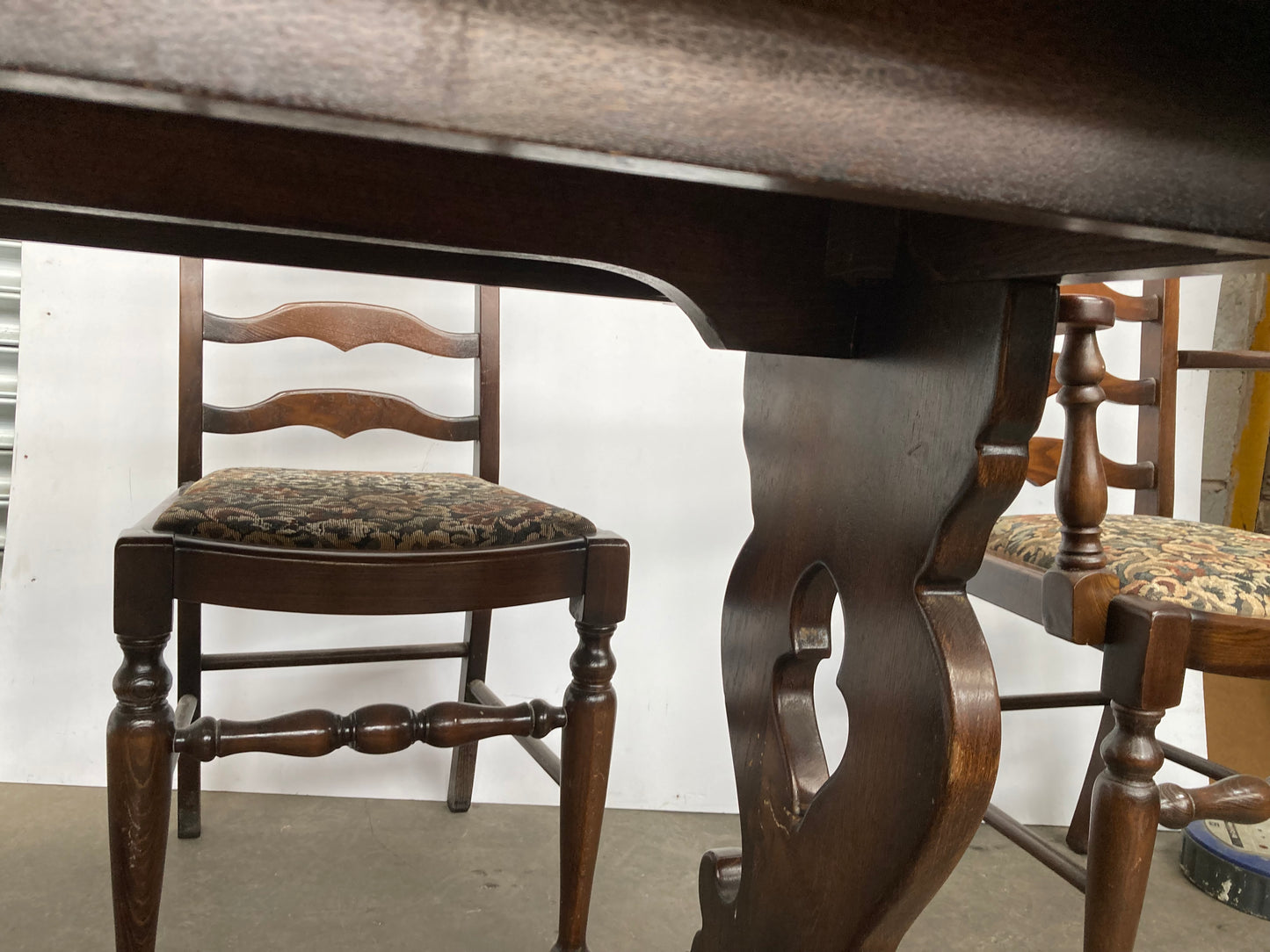 Dark oak dining table and 6 chairs