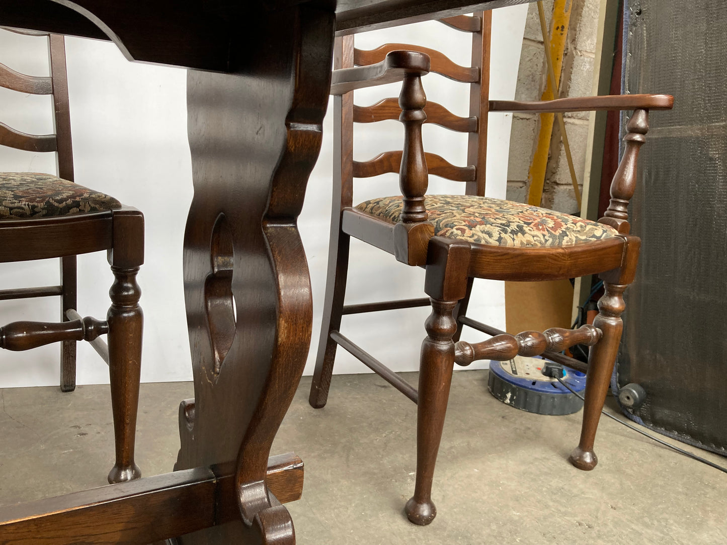 Dark oak dining table and 6 chairs