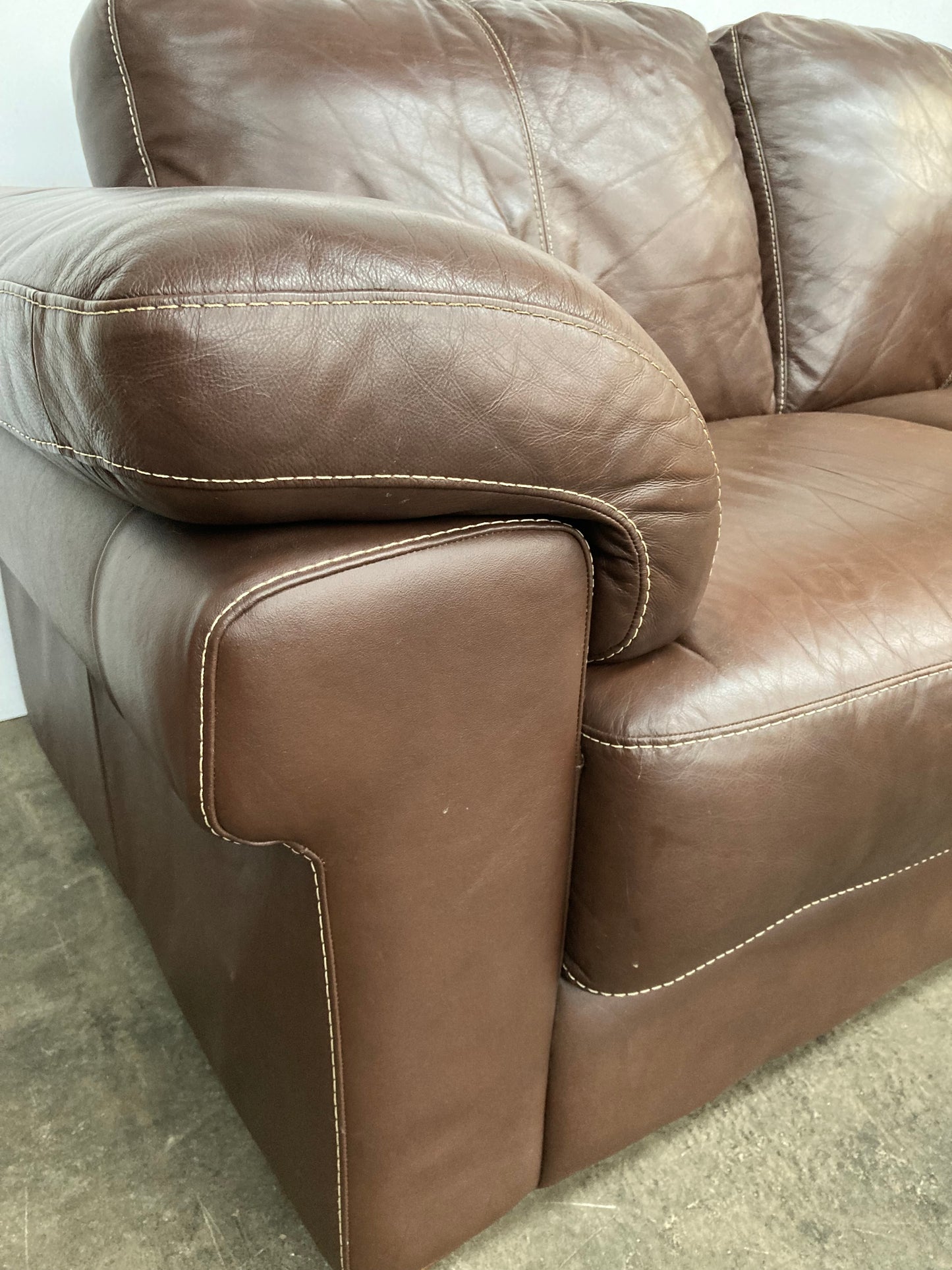Brown leather 2 seater sofa