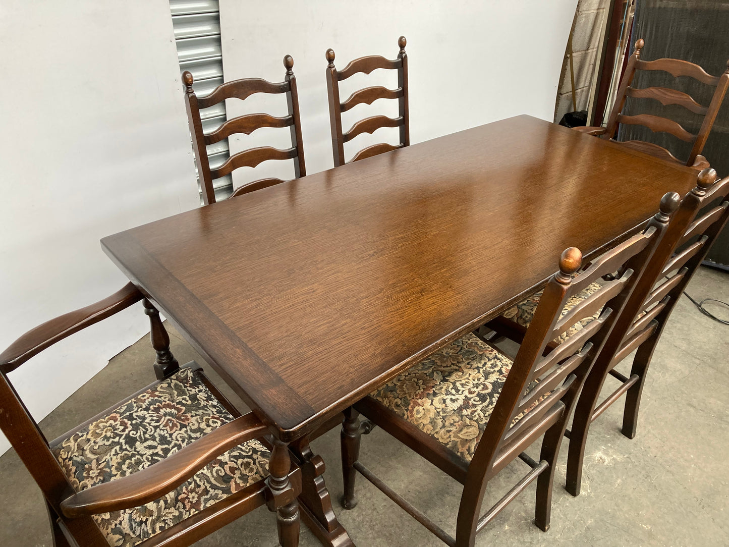 Dark oak dining table and 6 chairs