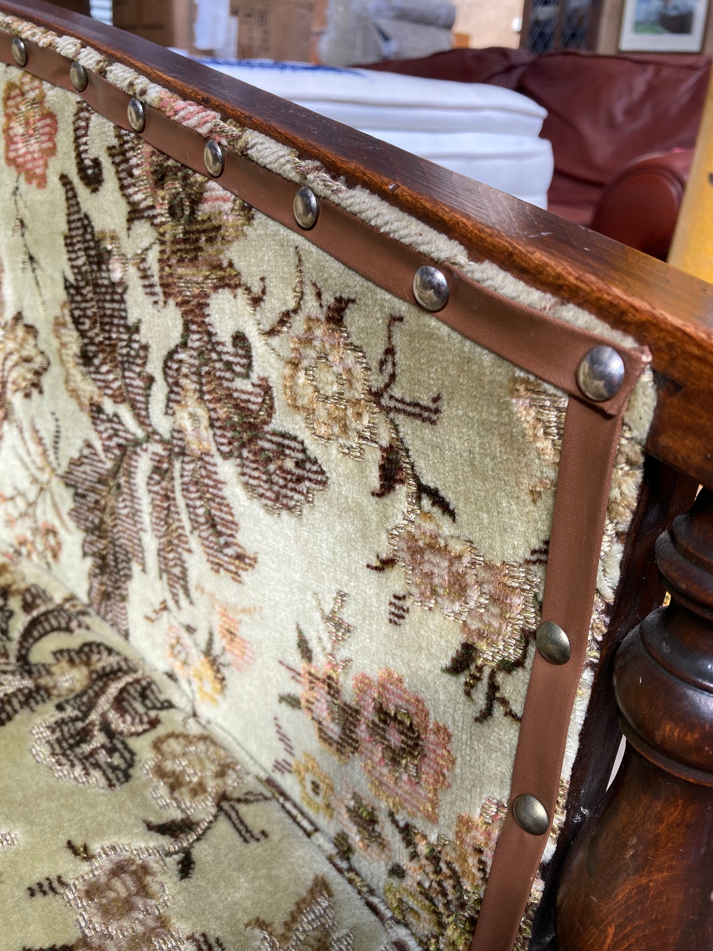 Vintage studded tub chair with floral fabric