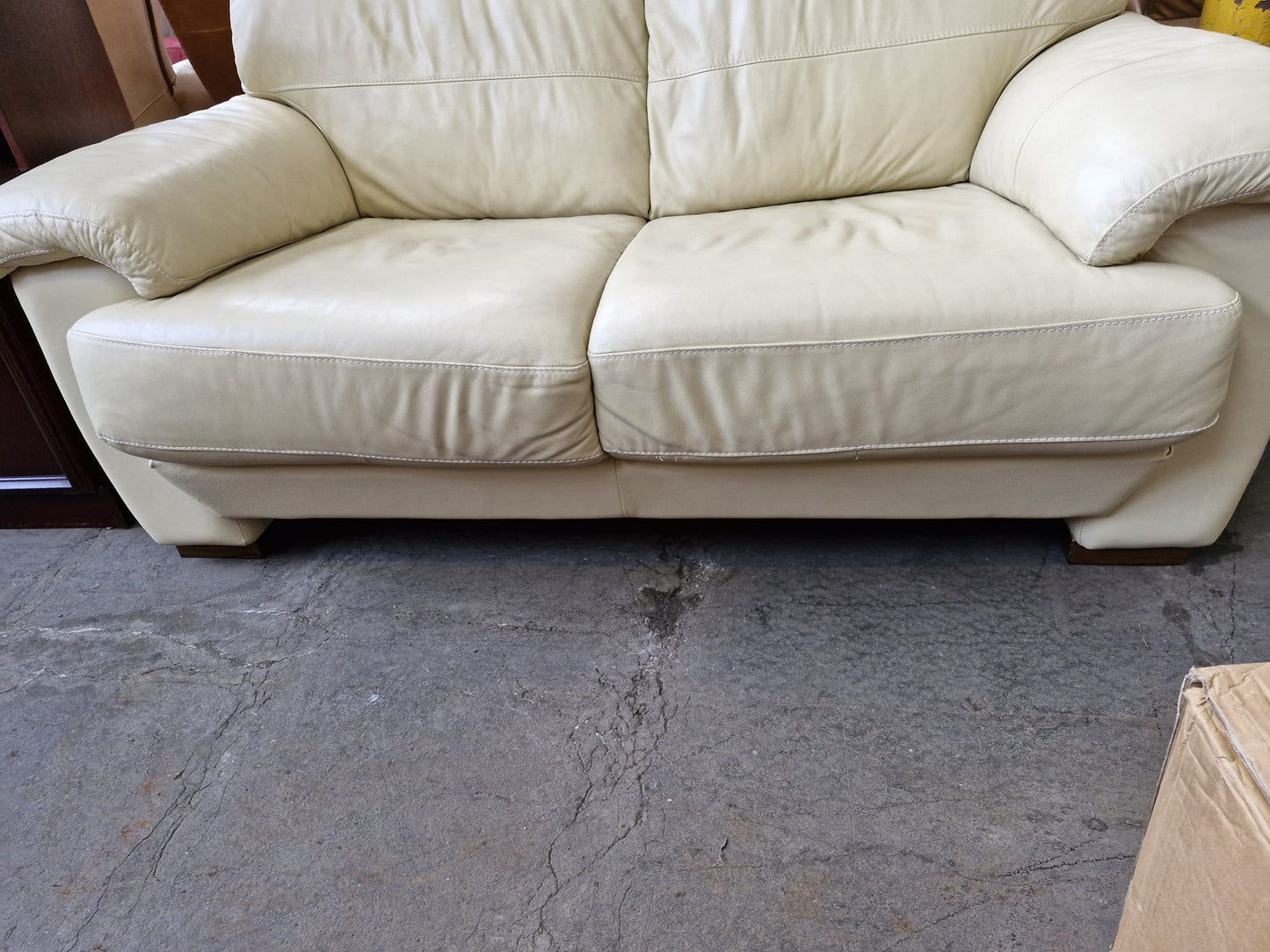 Cream leather 2 seater sofa