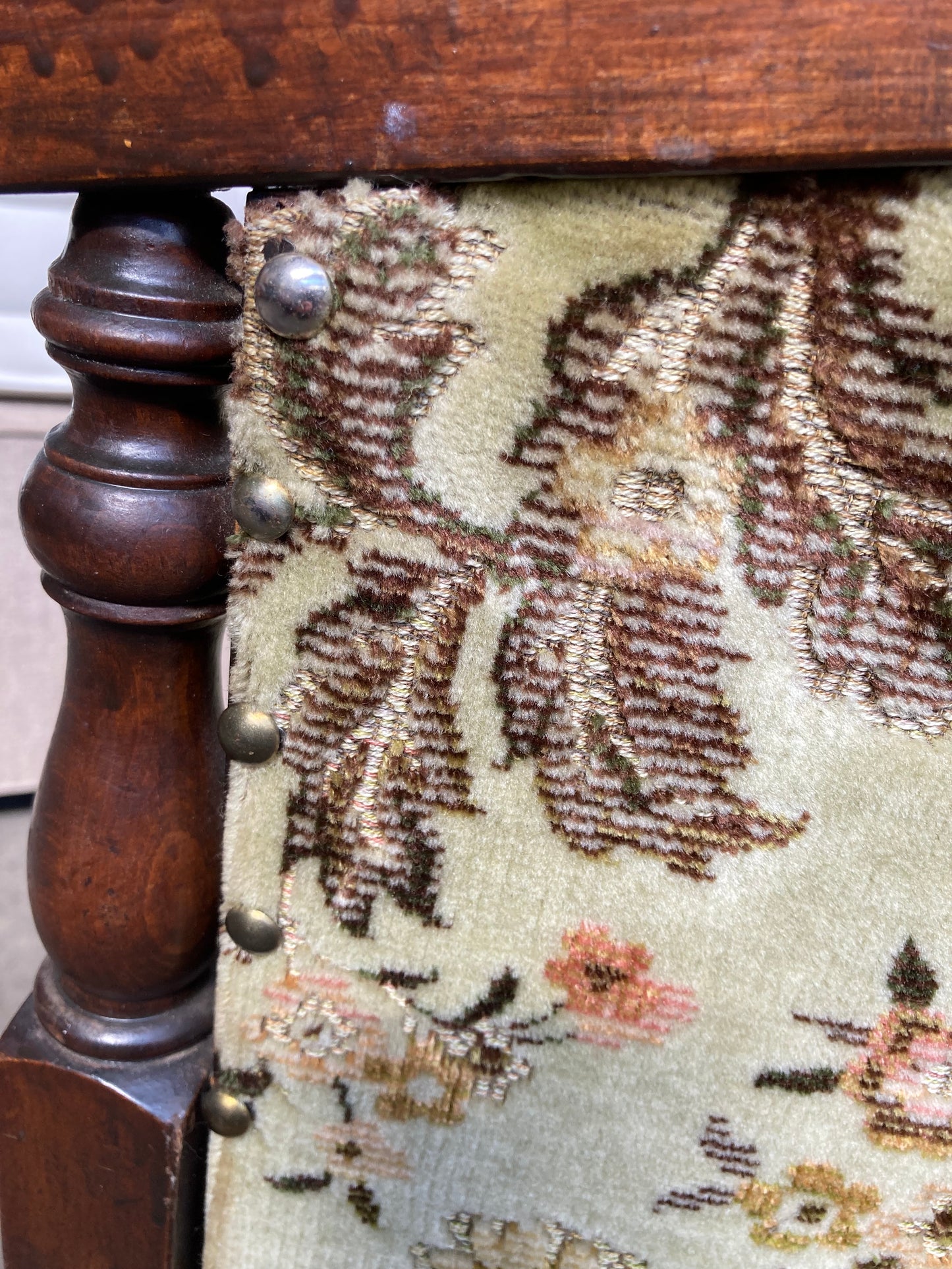 Vintage studded tub chair with floral fabric