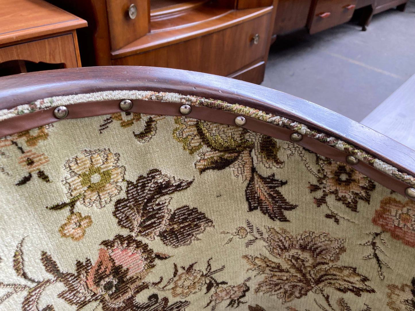 Vintage studded tub chair with floral fabric