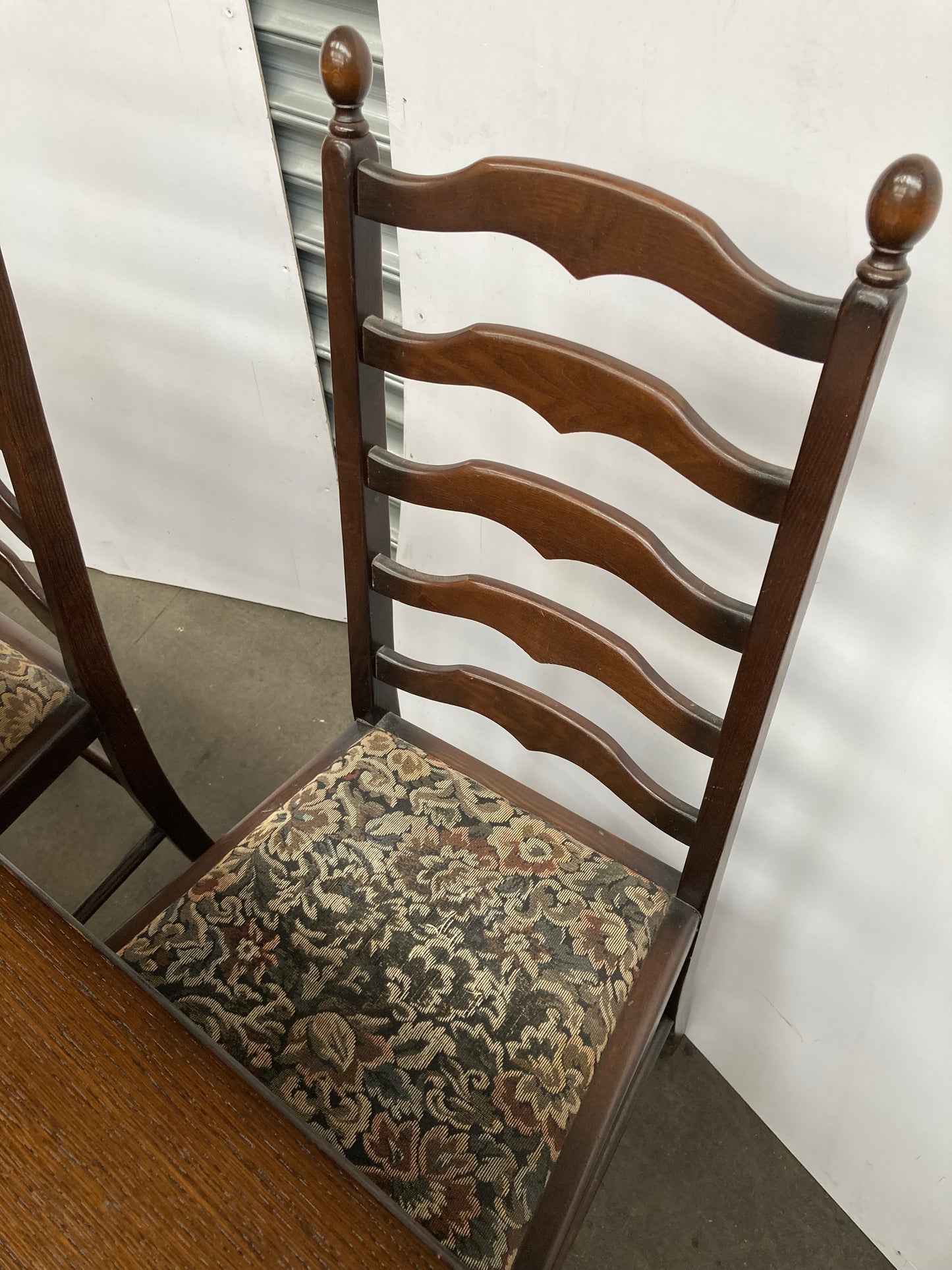 Dark oak dining table and 6 chairs