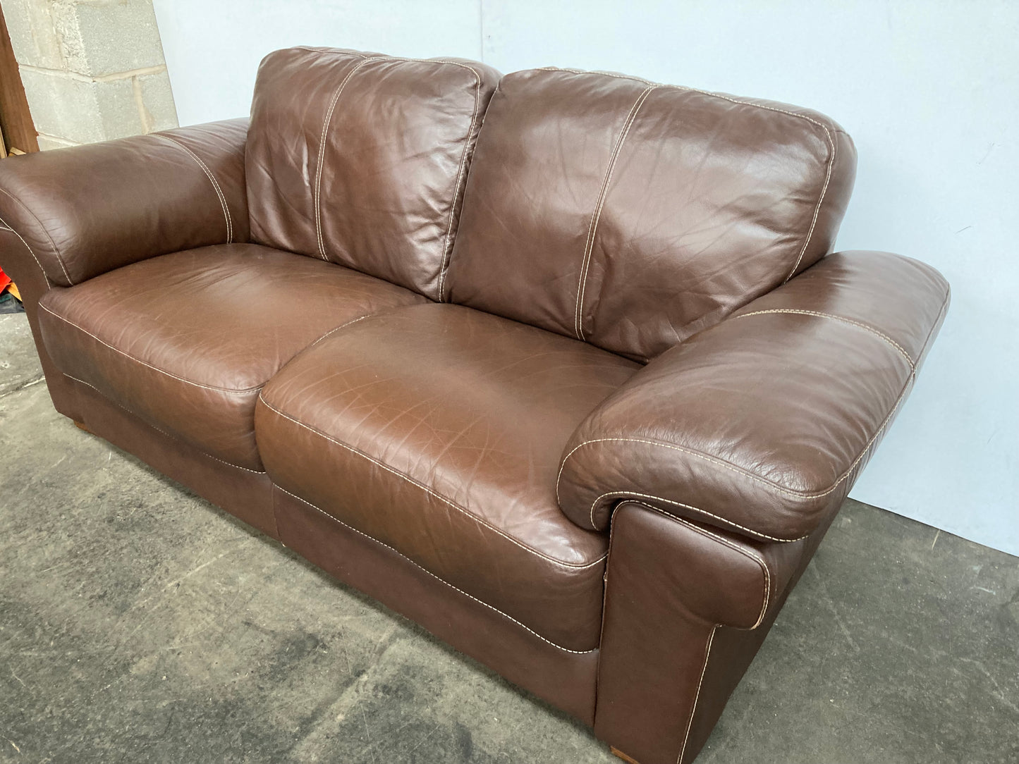 Brown leather 2 seater sofa