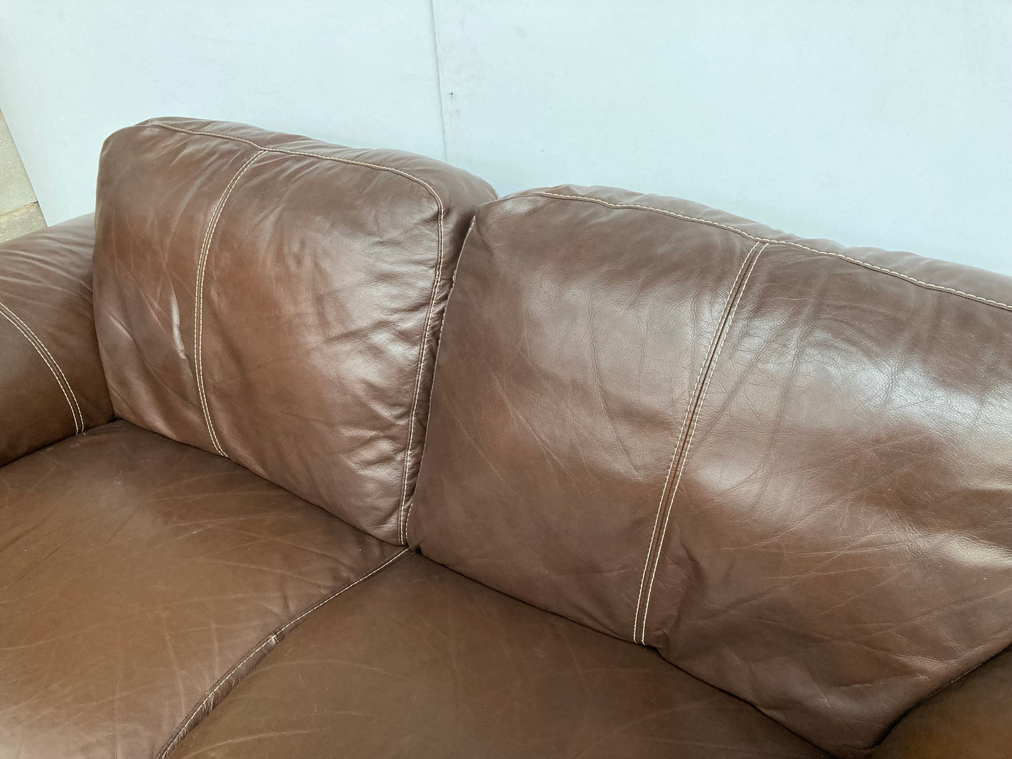 Brown leather 2 seater sofa