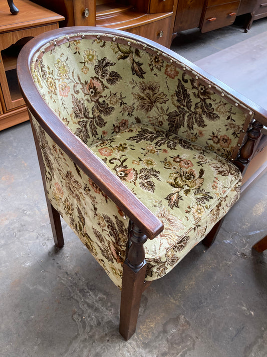 Vintage studded tub chair with floral fabric